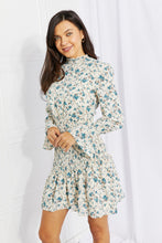 Load image into Gallery viewer, Meadowscape Floral Smocked Mock Neck Mini Dress
